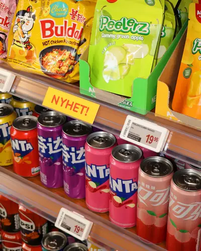 Electronic shelf labels showing prices on a drinks shelf